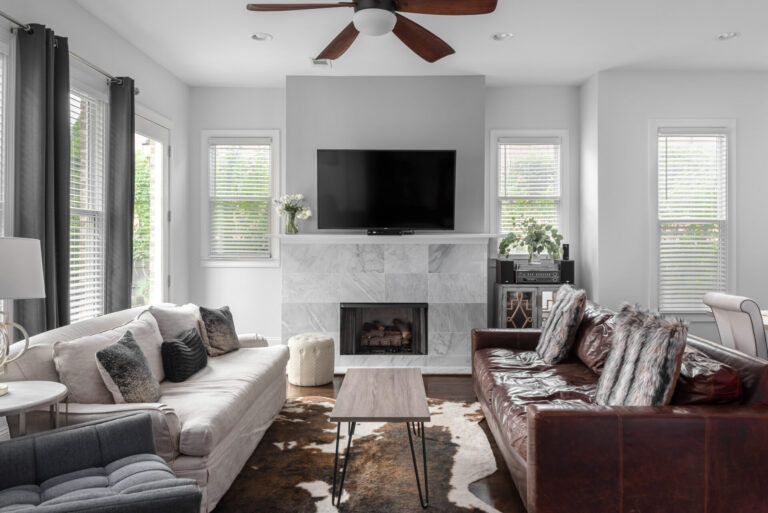 A living room with new faux wood blinds