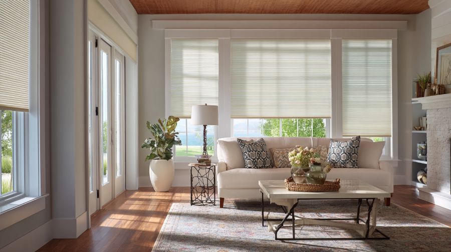A sunny living room with new blinds installed.